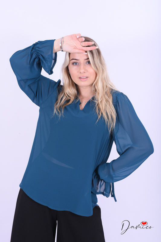 Blusa con fiocchetti