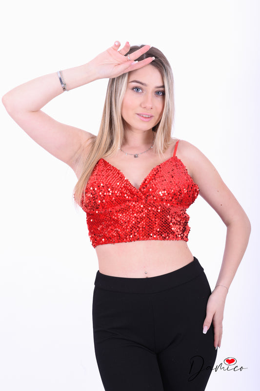 Top paillettes con fiocco